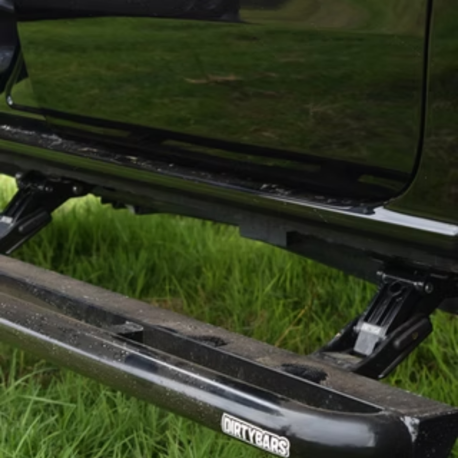 Dirty 4x4 electric side steps fitted to off-road vehicle
